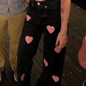 MINGA London black jeans with pink hearts